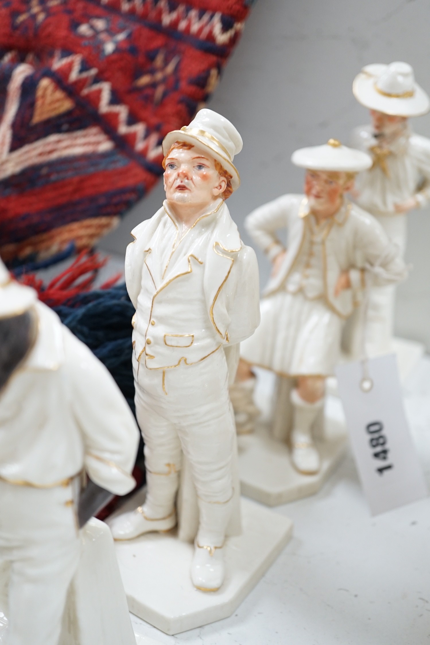 Seven Royal Worcester Hadleys figures of the World, tallest 17.5 cm